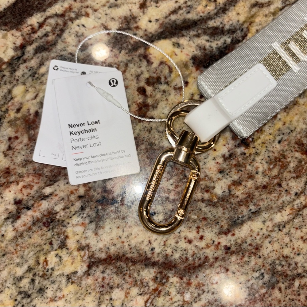 Lululemon Never Lost Keychain Vapor Gold Brand New NWT - Picture 4 of 5